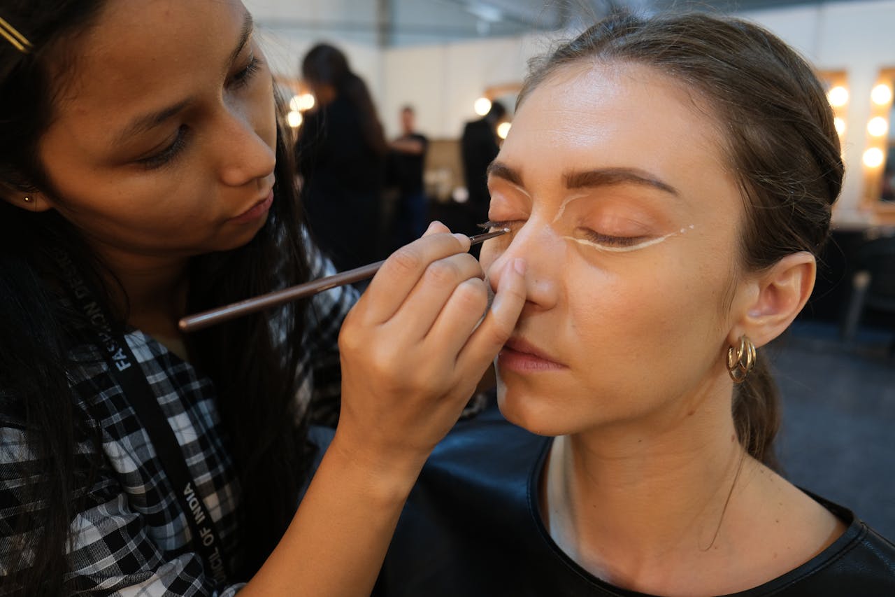 woman working as a makeup artist