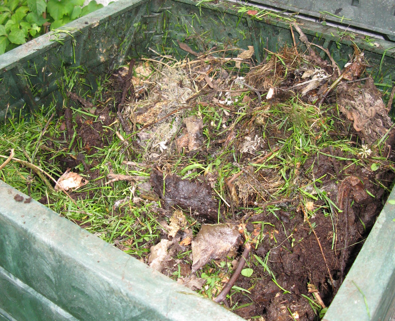 Close Up Photo of Full compost bin
