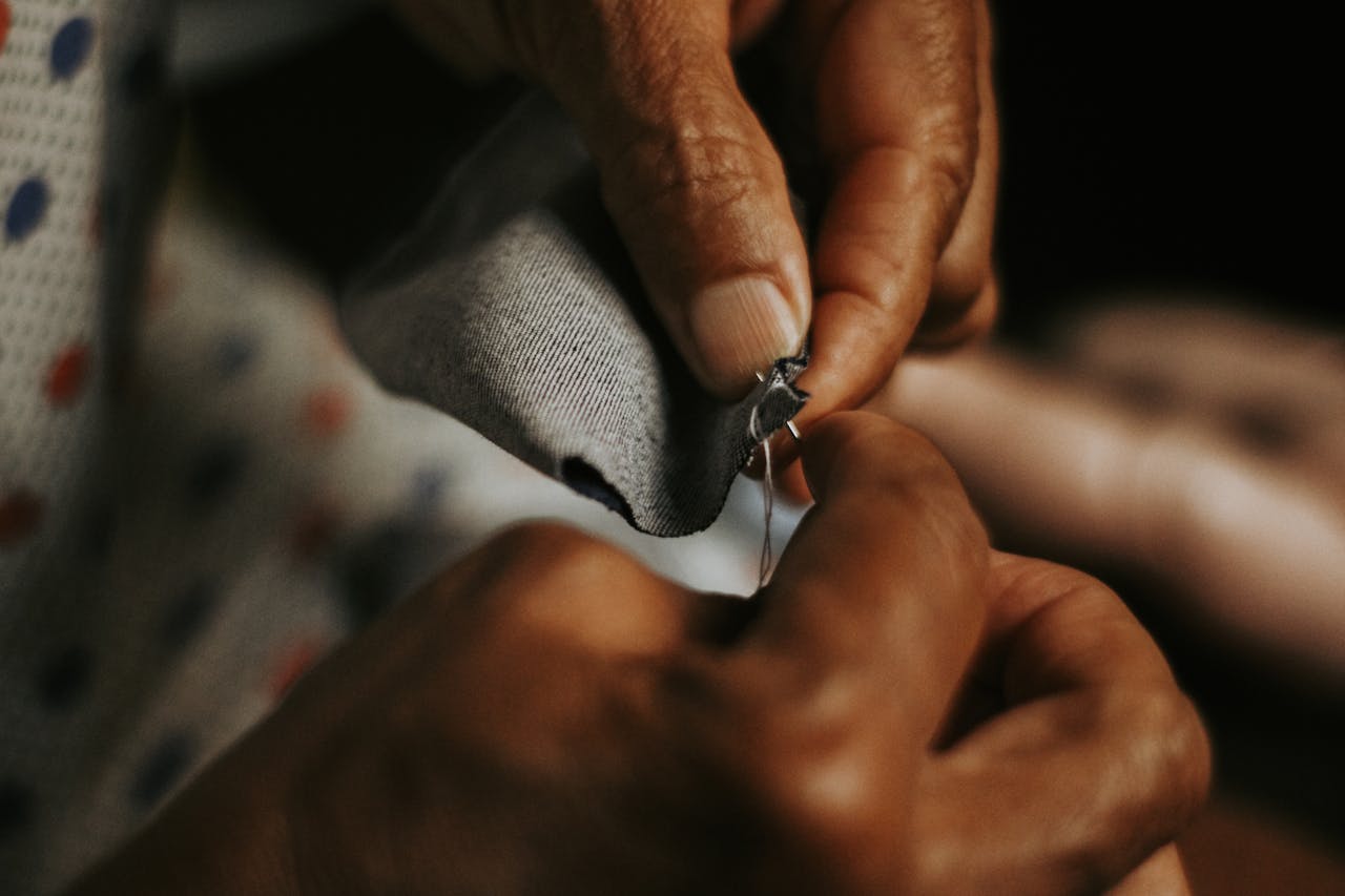 Close Up of Woman Hands Sewing
