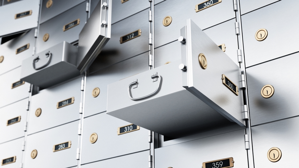 Bank deposit boxes with some open drawers
