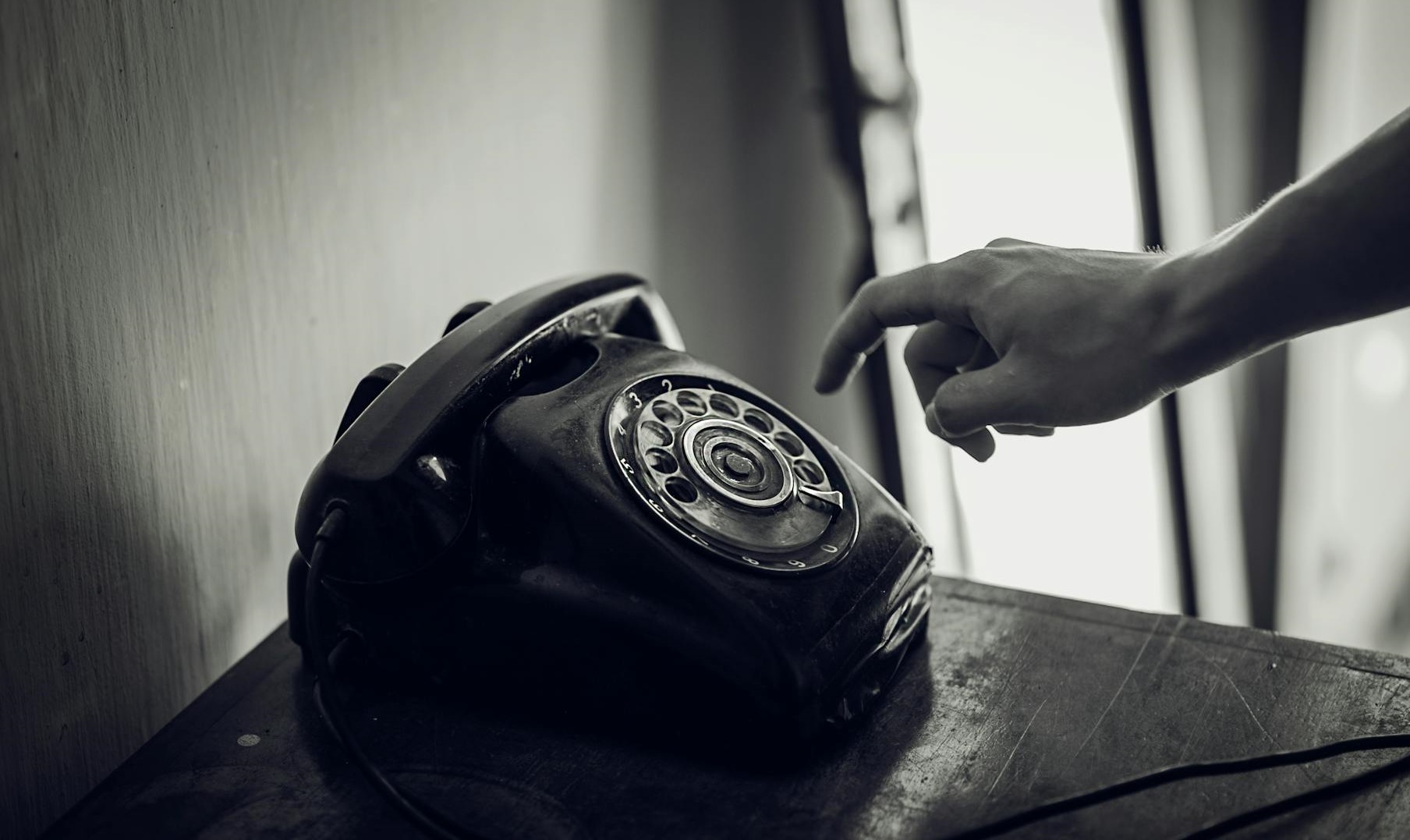 Grayscale Photo of Rotary Telephone