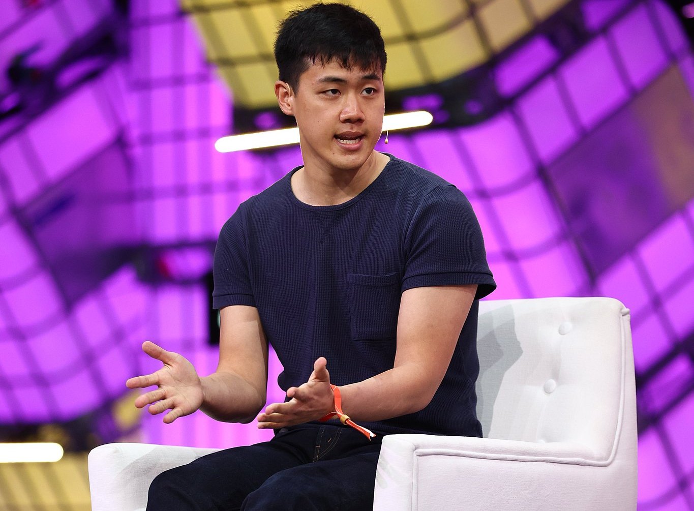 Andy Fang wearing black t-shirt  on Centre Stage during day two of Collision 2022