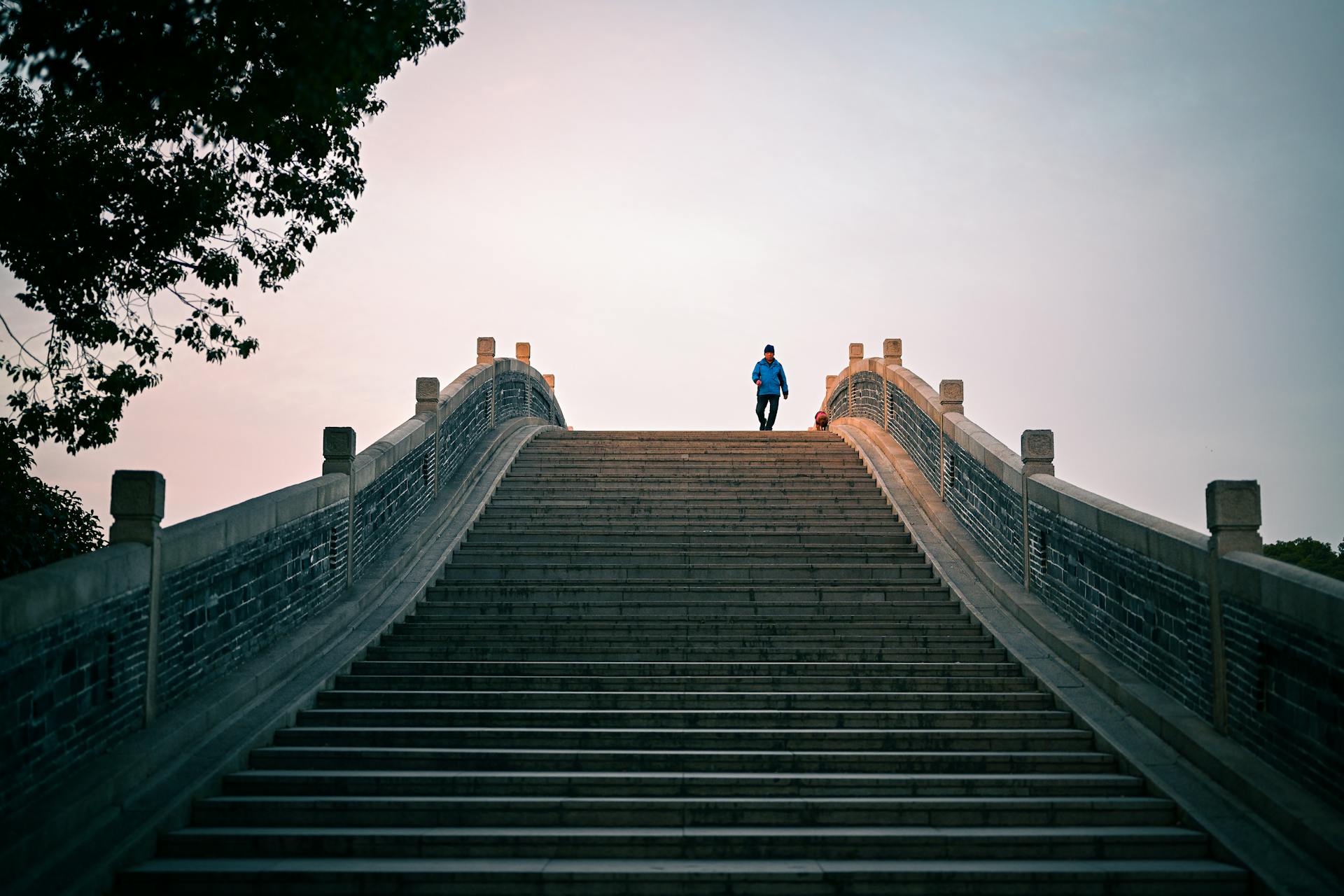 Man crossing a bridge