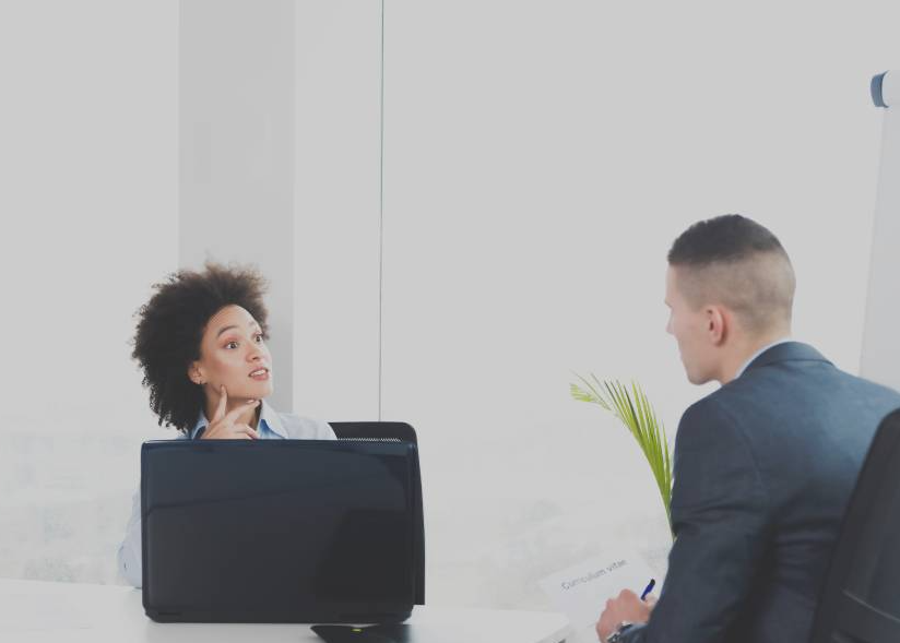 Portrait Photo of a man during a job interview in office