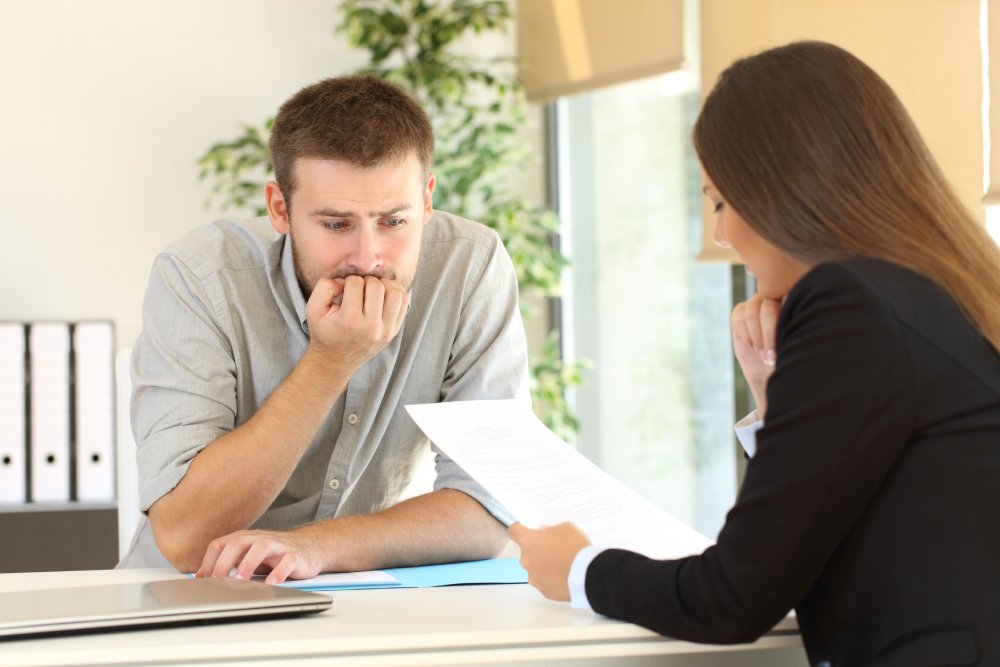 Portrait Photo of a man during a job interview in office