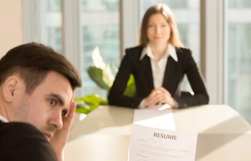 Portrait Photo of a man during a job interview in office
