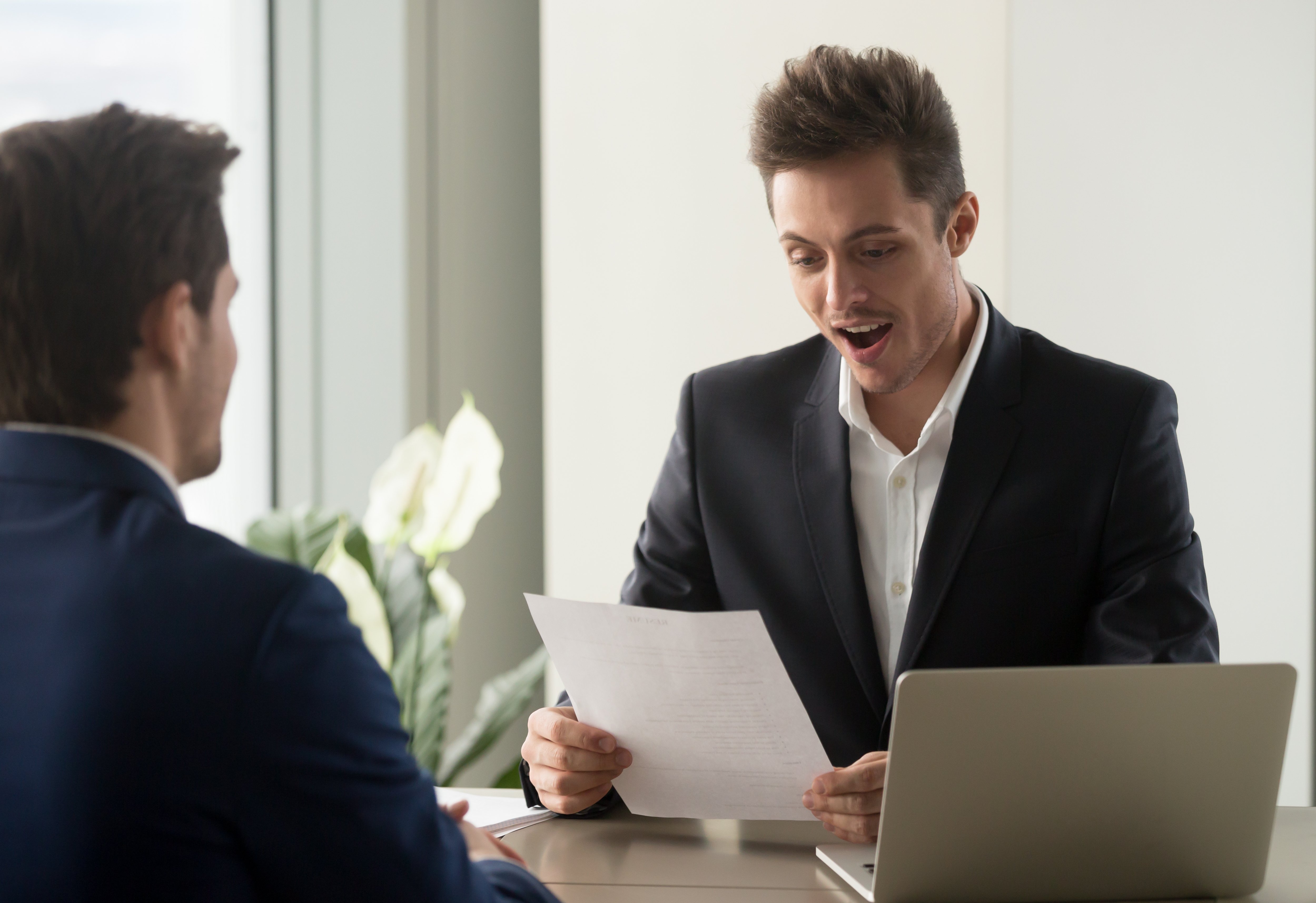 Portrait Photo of a man during a job interview in office