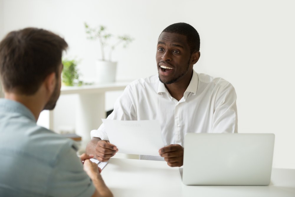 Portrait Photo of a man during a job interview in office