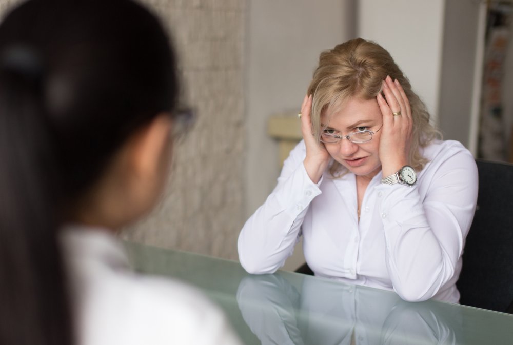 Portrait Photo of a woman during a job interview in office