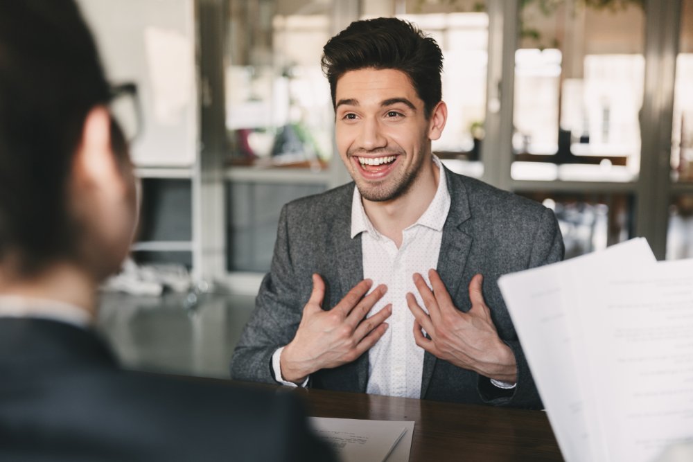 Portrait Photo of a man during a job interview in office
