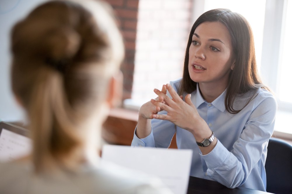Portrait Photo of a woman during a job interview in office
