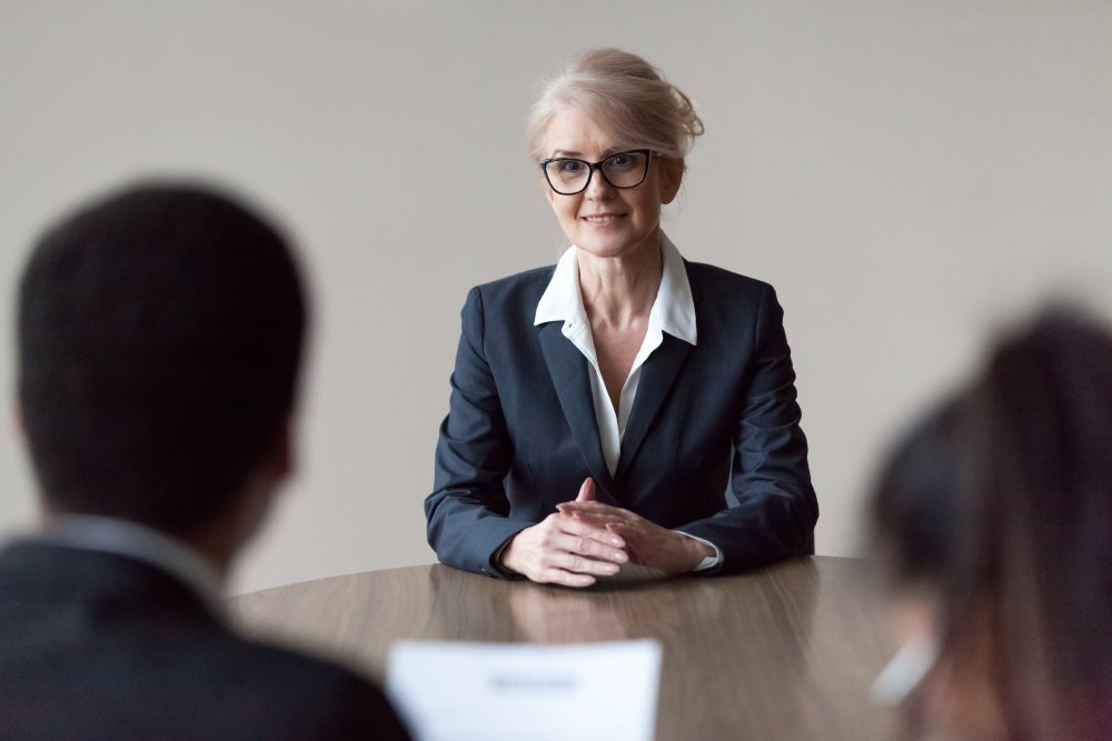 Portrait Photo of a woman during a job interview in office