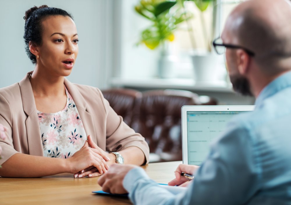 Portrait Photo of a woman during a job interview in office