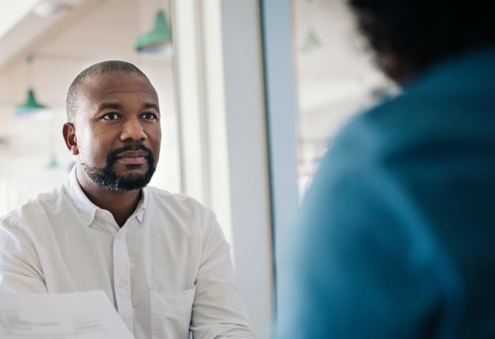 Portrait Photo of a man during a job interview in office