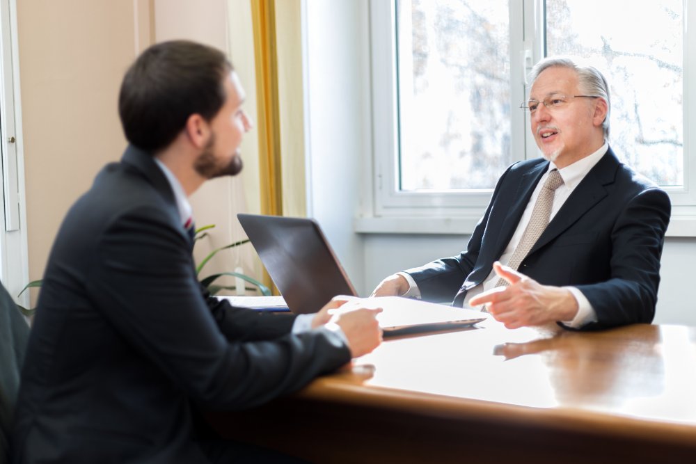 Portrait Photo of a man during a job interview in office