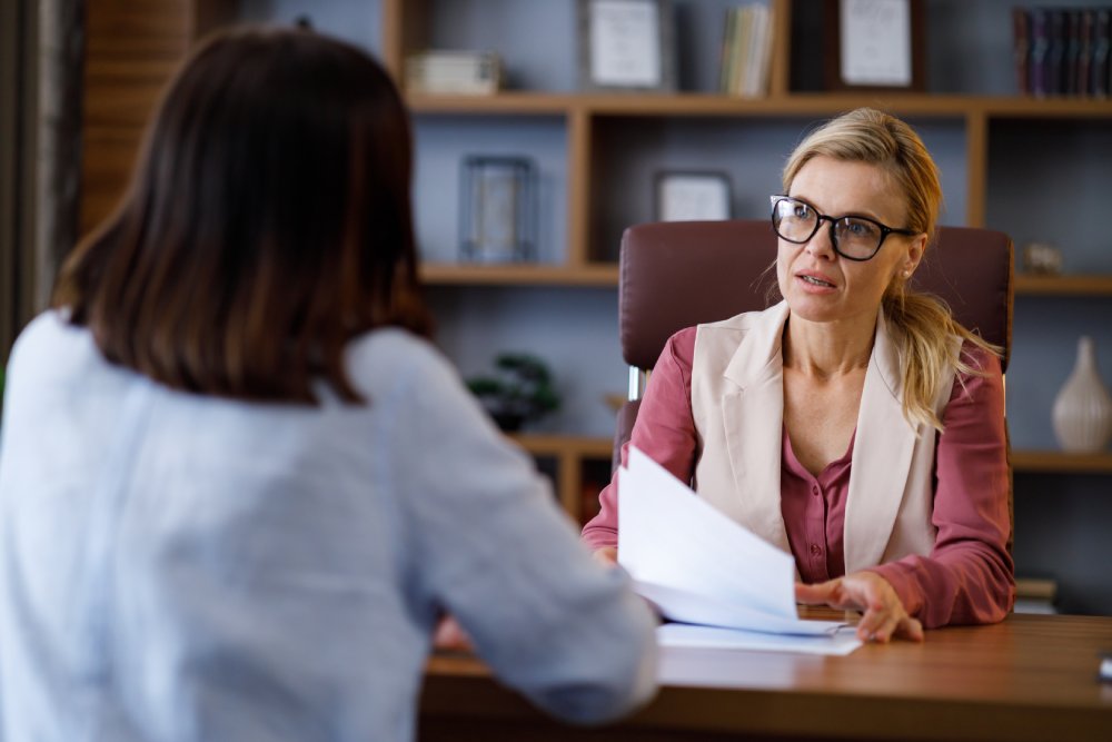 Portrait Photo of a woman during a job interview in office