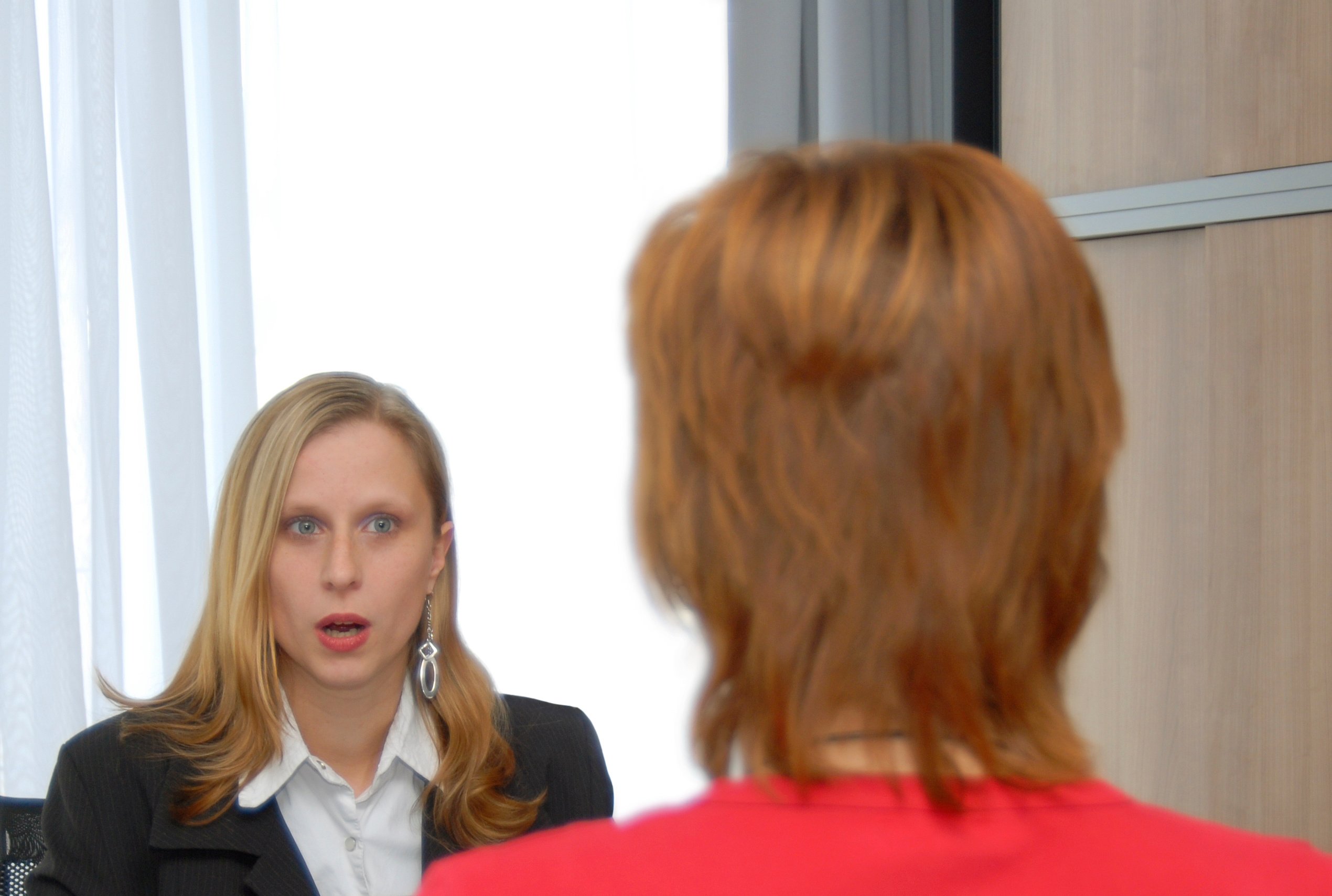 Portrait Photo of a woman during a job interview in office