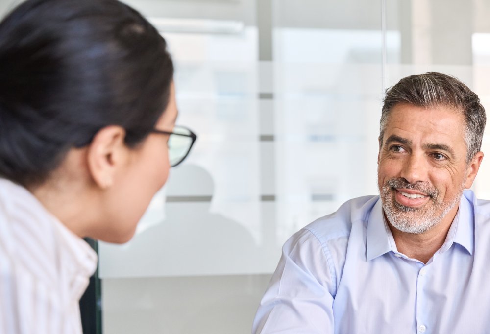 Portrait Photo of a man during a job interview in office