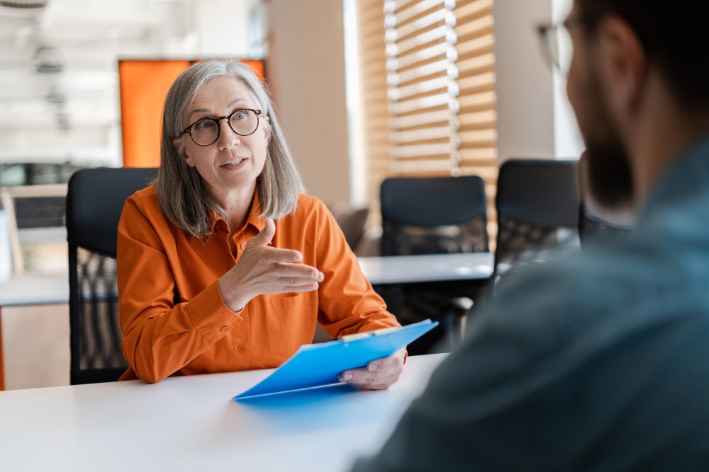 Portrait Photo of a woman during a job interview in office