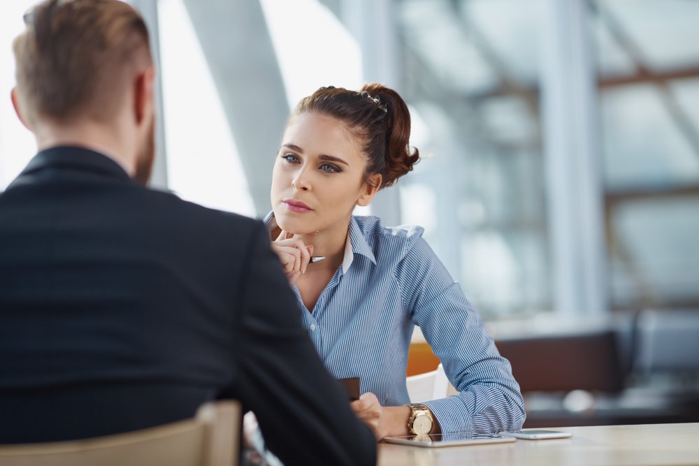Portrait Photo of a woman during a job interview in office