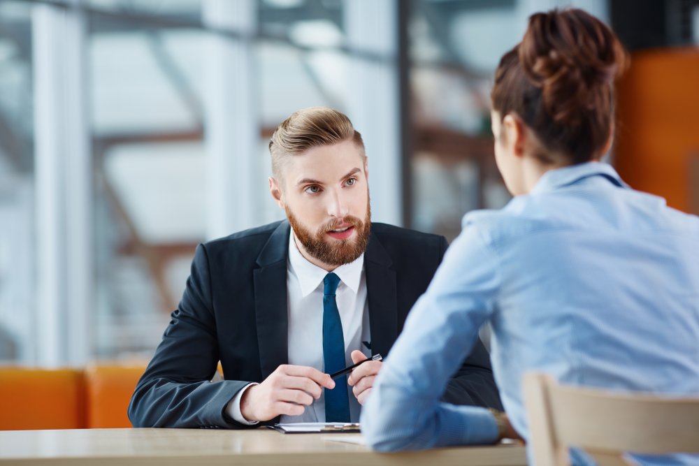 Portrait Photo of a man during a job interview in office