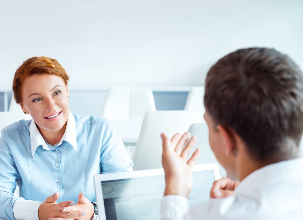 Portrait Photo of a woman during a job interview in office