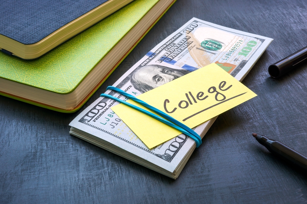 Bundle of money with the inscription college. Tuition payment.