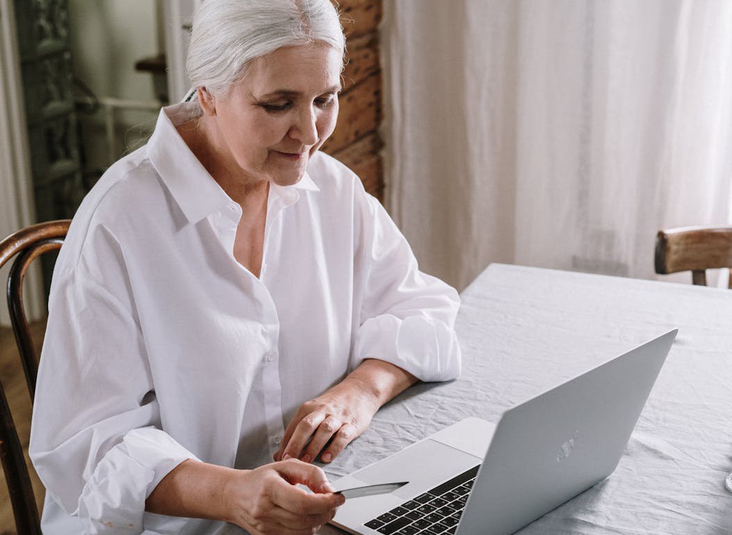 An Old Woman Wearing White Shirt