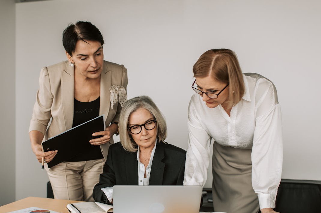 Elderly Women in a Business Meeting