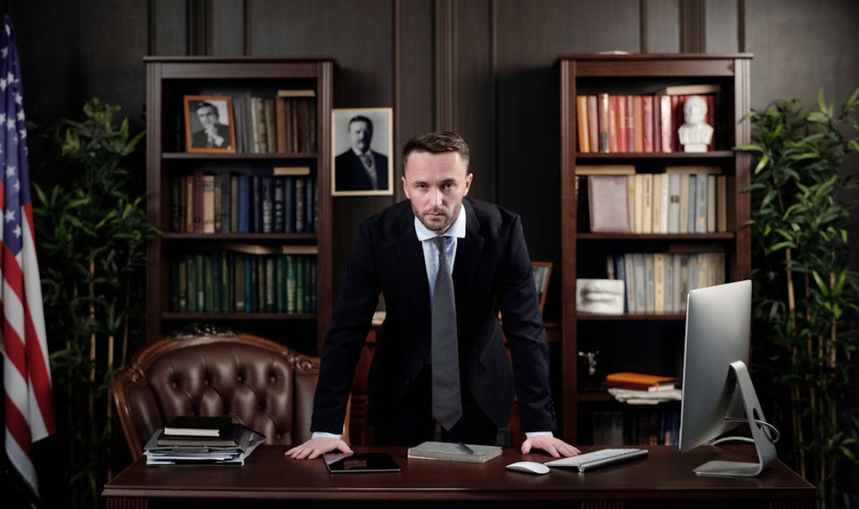 businessman-in-his-office-looking-at-the-camera