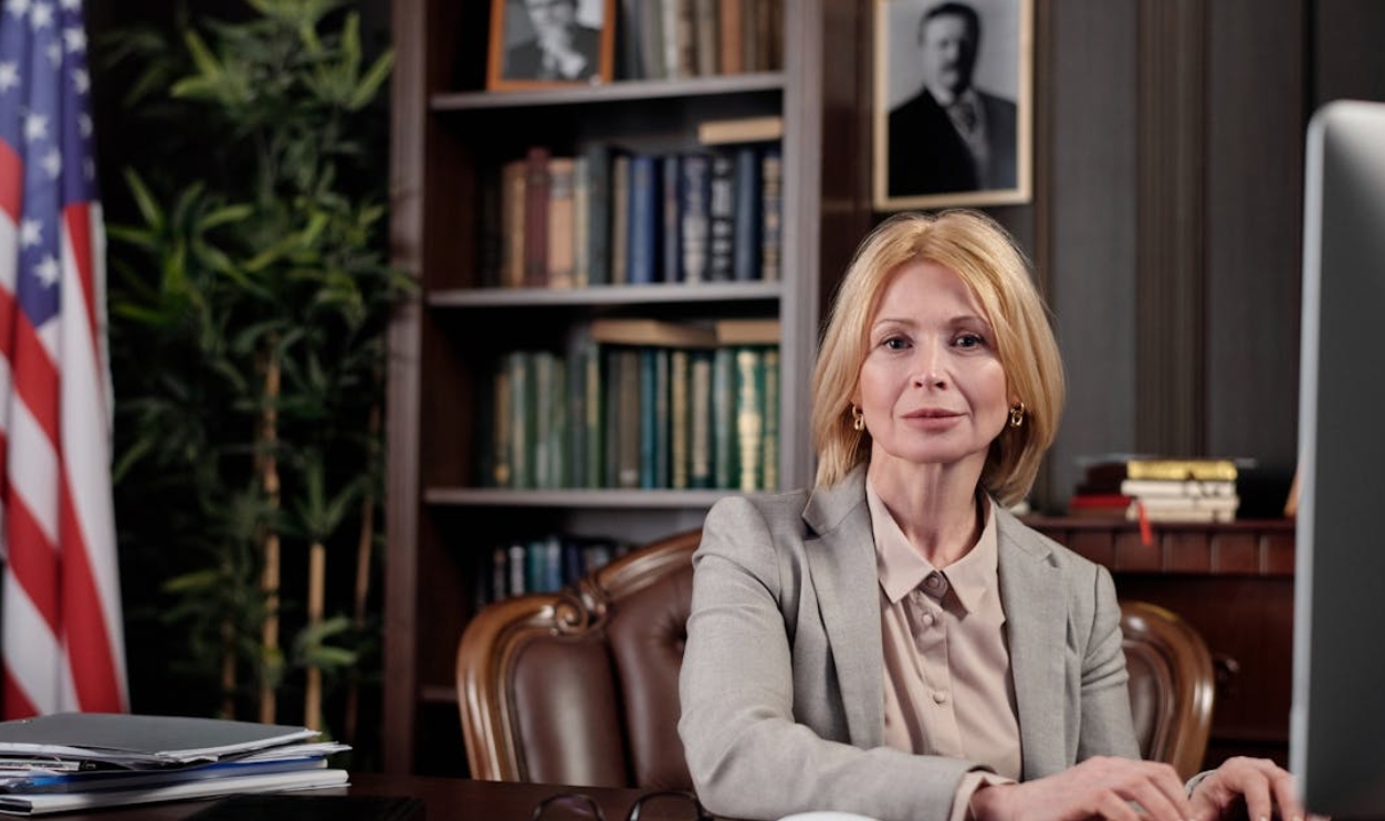 /businesswoman-sitting-in-her-office