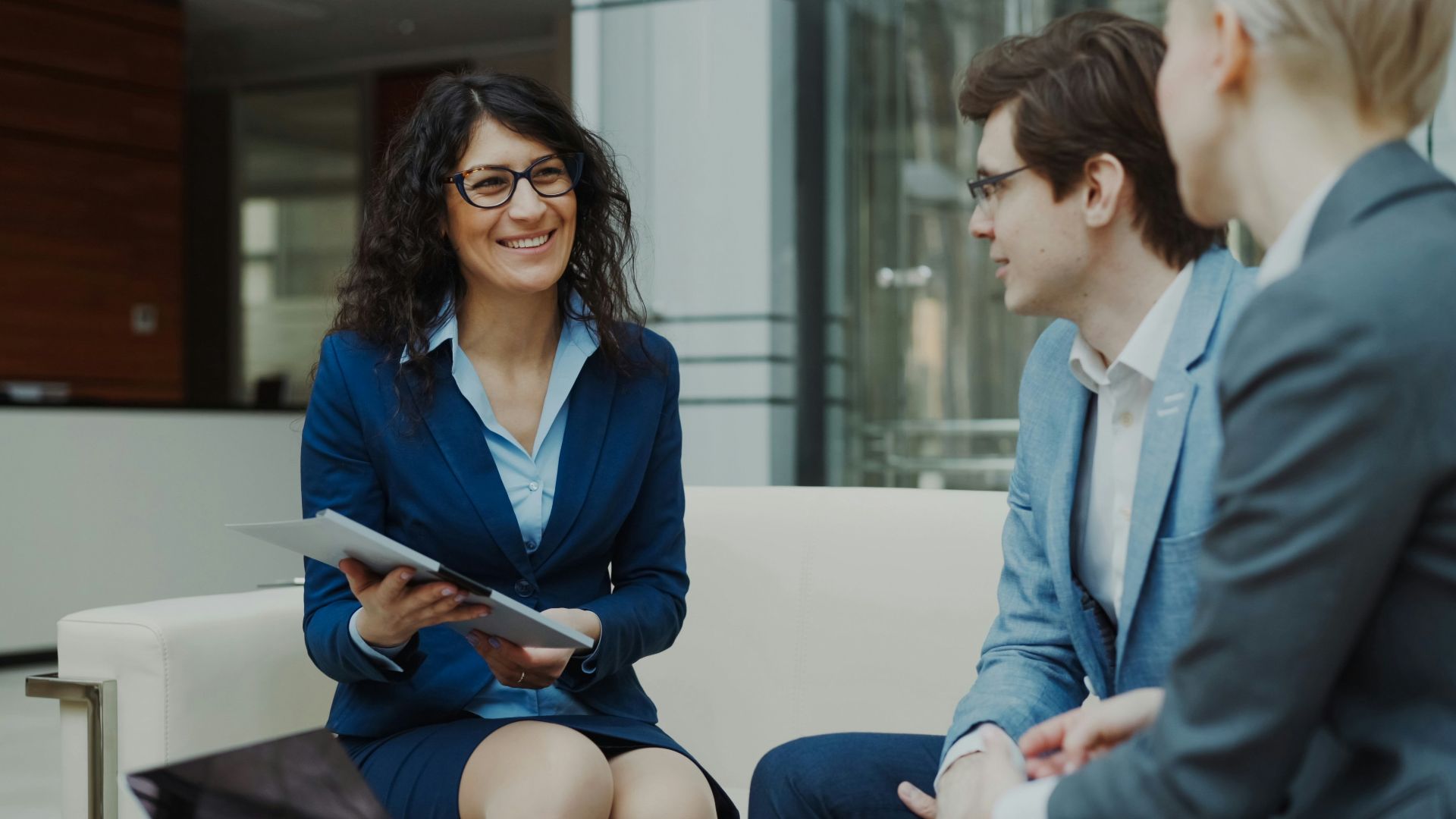 Three business people in a meeting