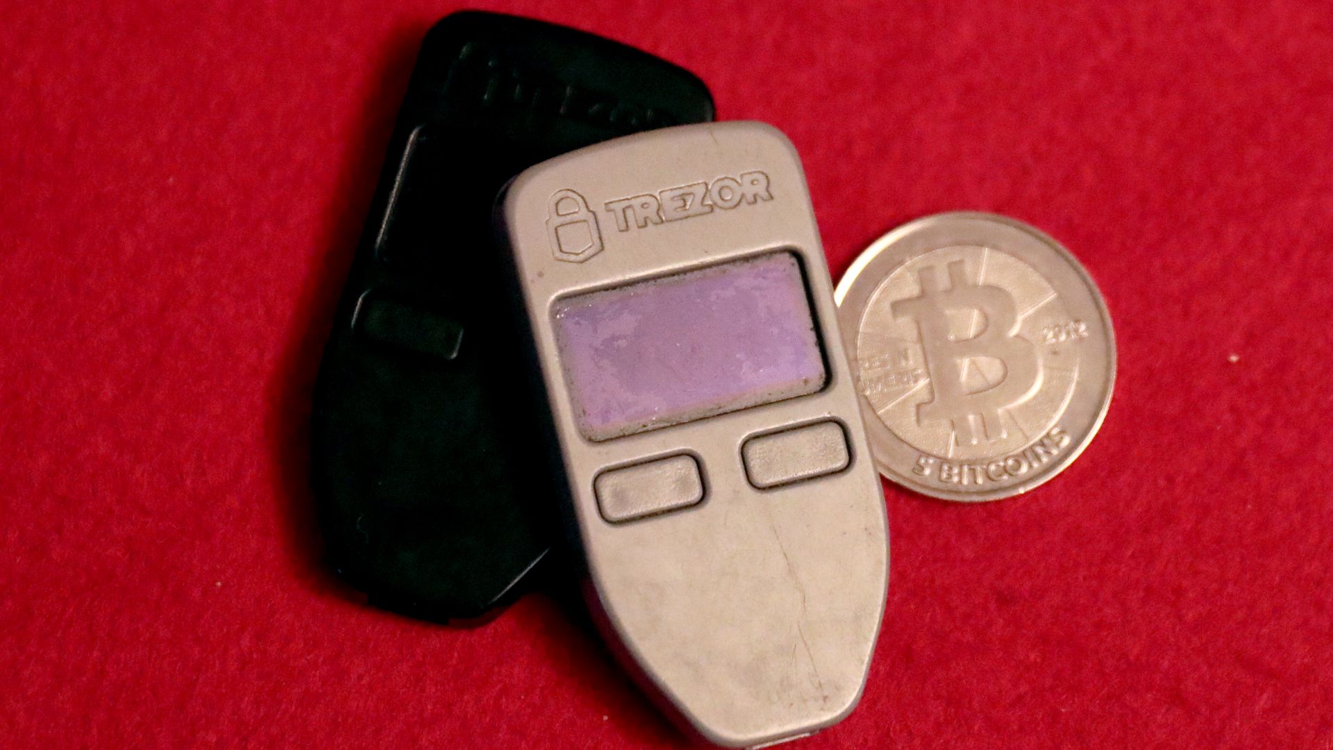 File:Two Trezor One hardware wallets and a 5BTC Casascius physical coin by Gage Skidmore.jpg