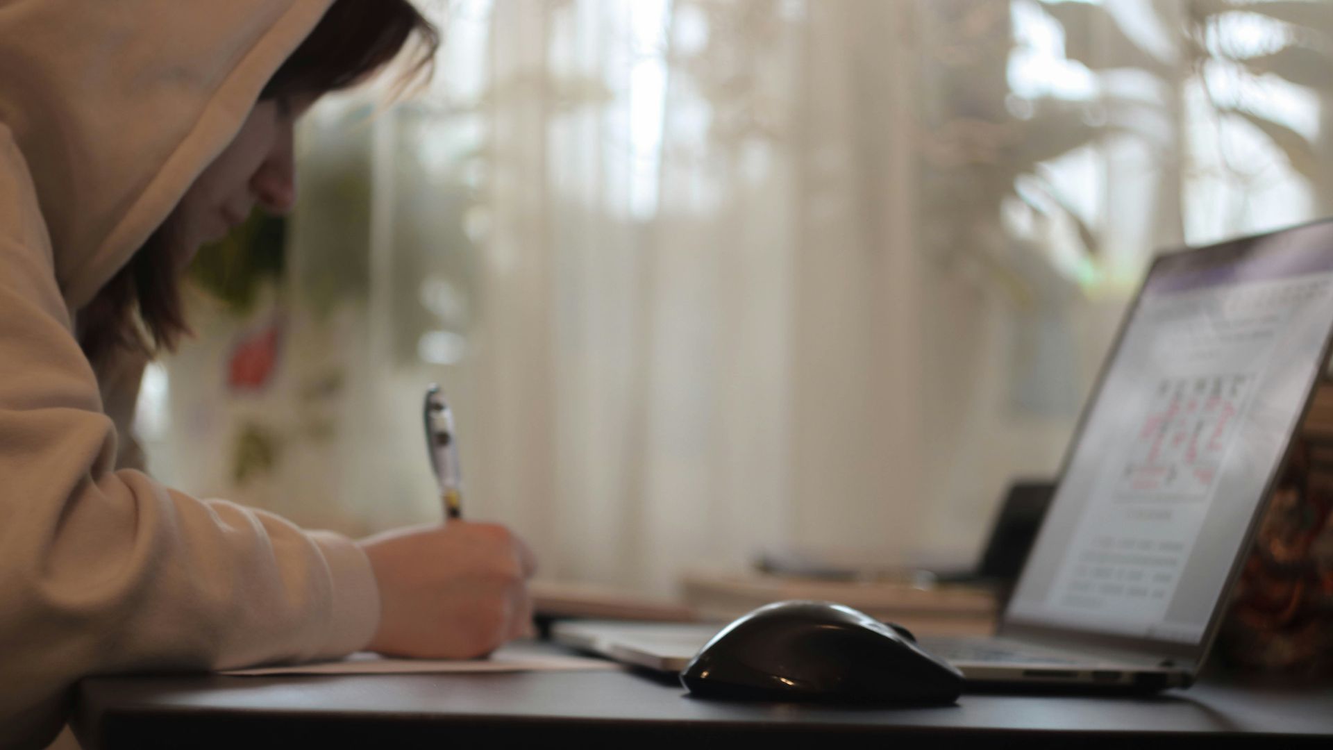 black computer mouse on white table