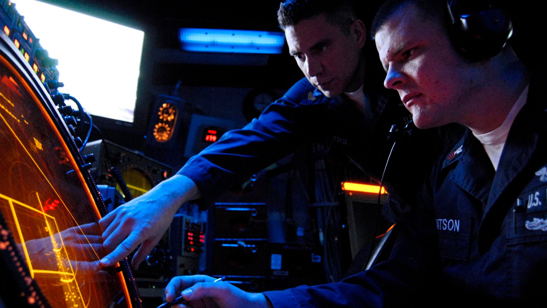 File:US Navy 070205-N-9689V-001 Air Traffic Controller 1st Class Otto Delacruz identifies an air contact to Air Traffic Controller 1st Class Brent Watson standing watch in the ship's helicopter direction center aboard USS Boxer (LHD.jpg