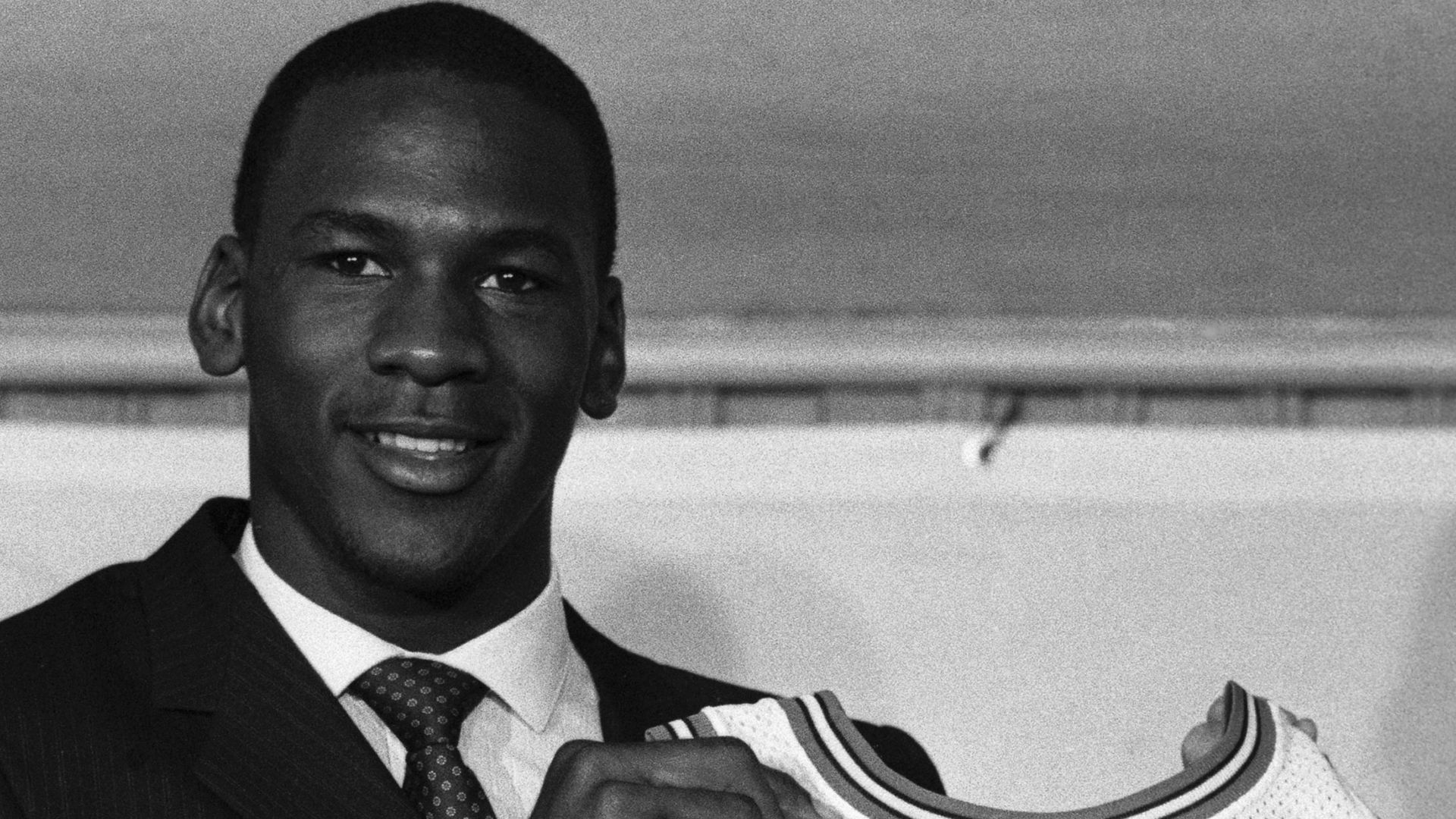 File:Michael Jordan holds up his Chicago Bulls jersey on September 12, 1984.jpg