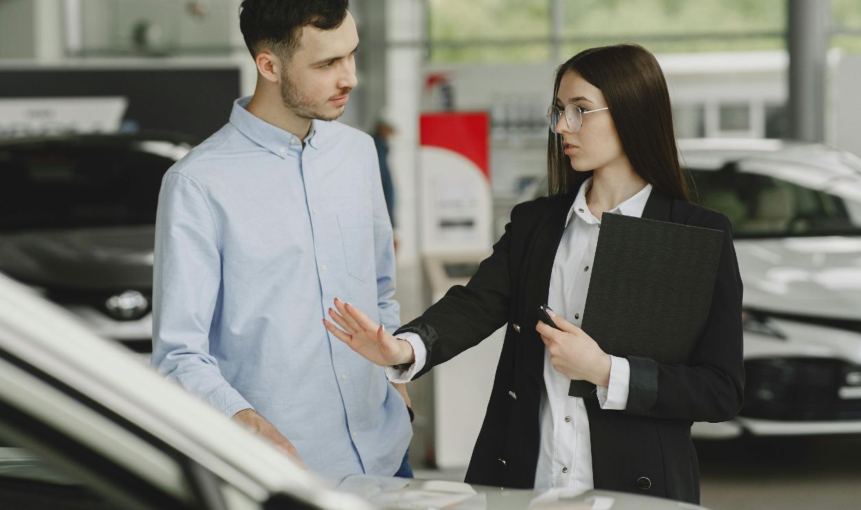 Woman selling car