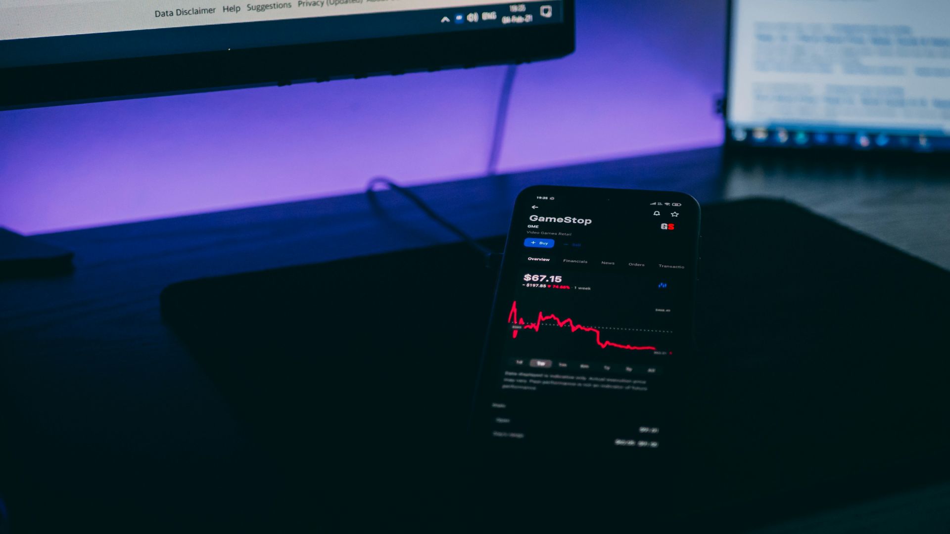 black android smartphone on black laptop computer