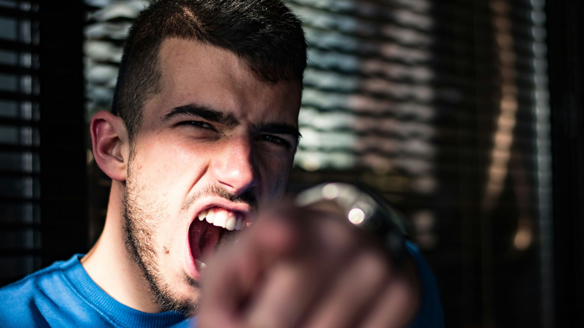 man in blue crew neck shirt