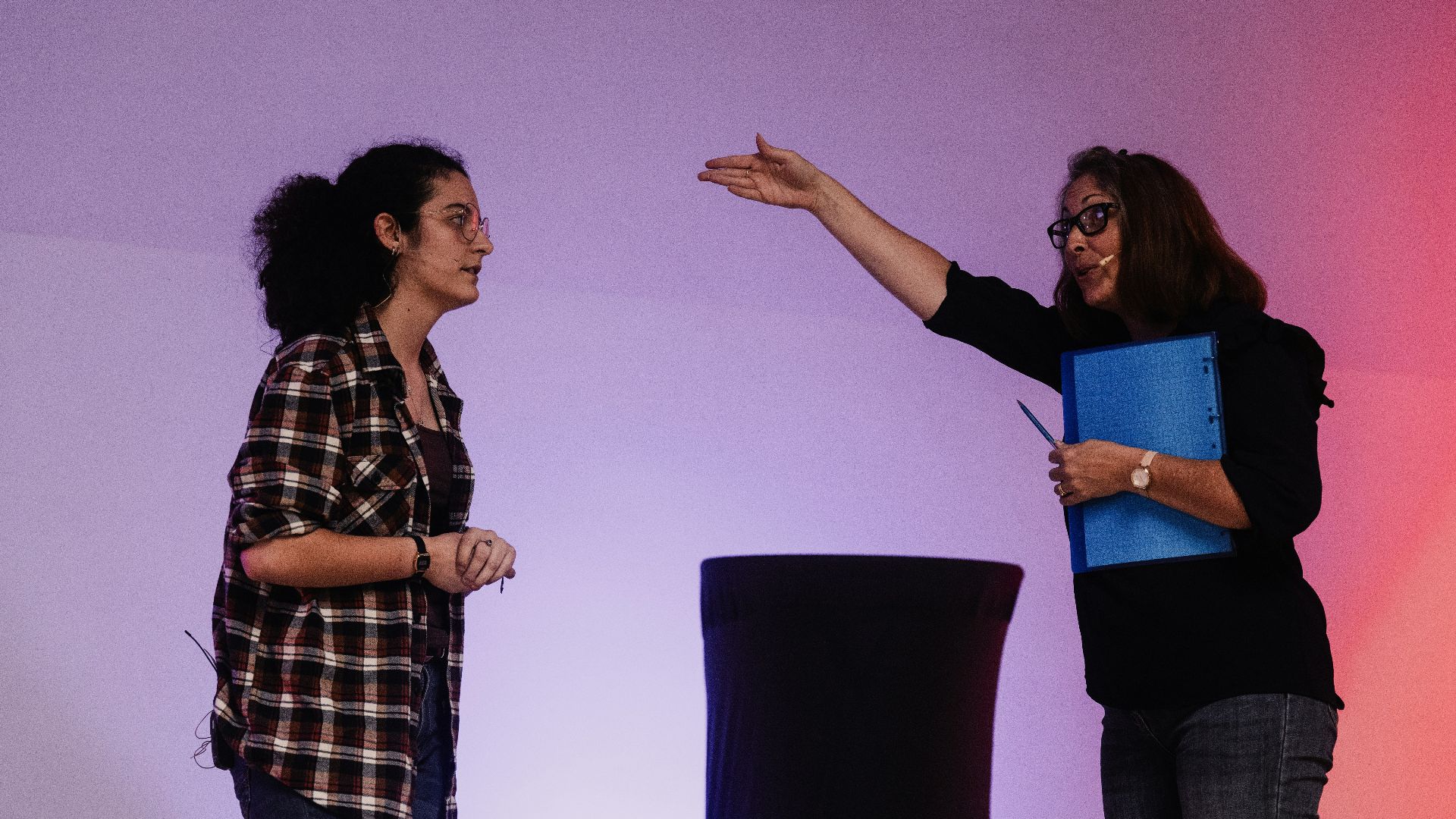A couple of women standing next to each other