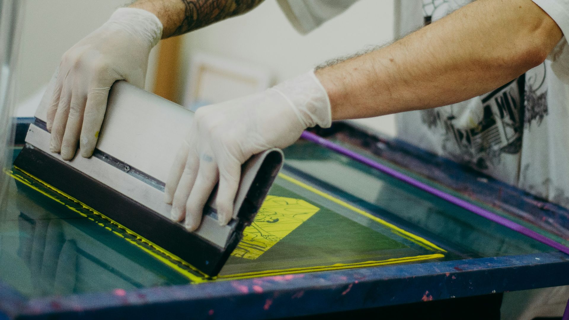 a man in a white shirt and white gloves