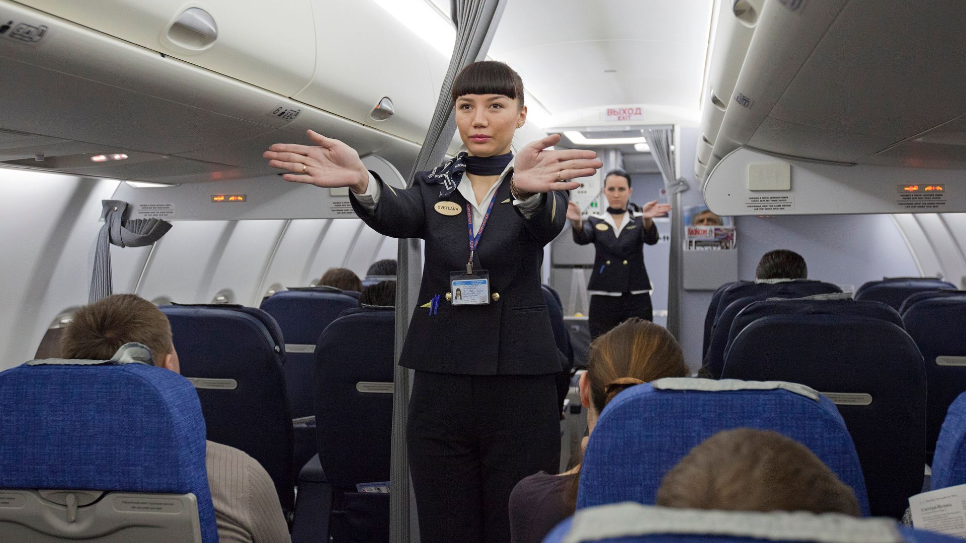 File:Flight attendants performing a pre-flight safety demonstration on an Aeroflot Sukhoi Superjet.jpg