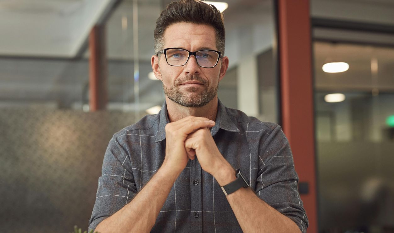 A Man Sitting at the Table