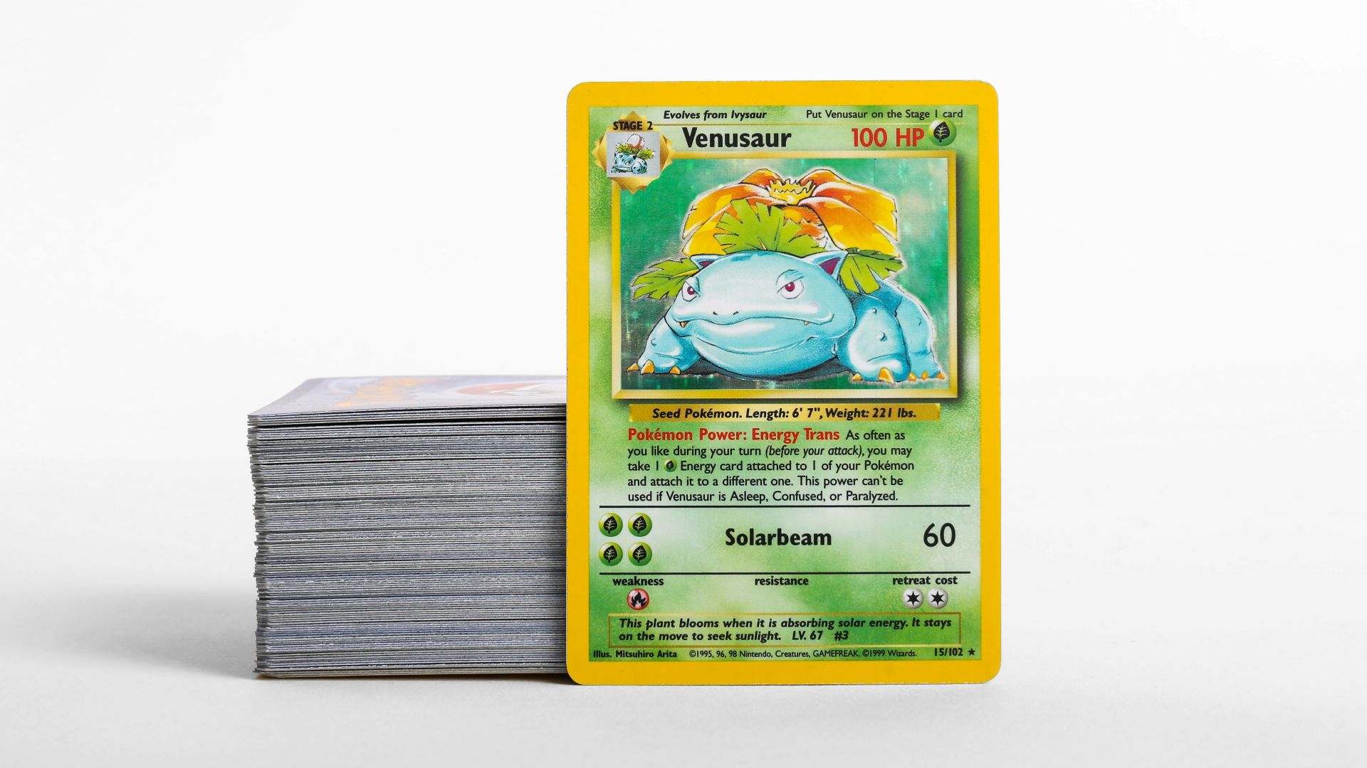 a stack of pokemon cards sitting on top of each other