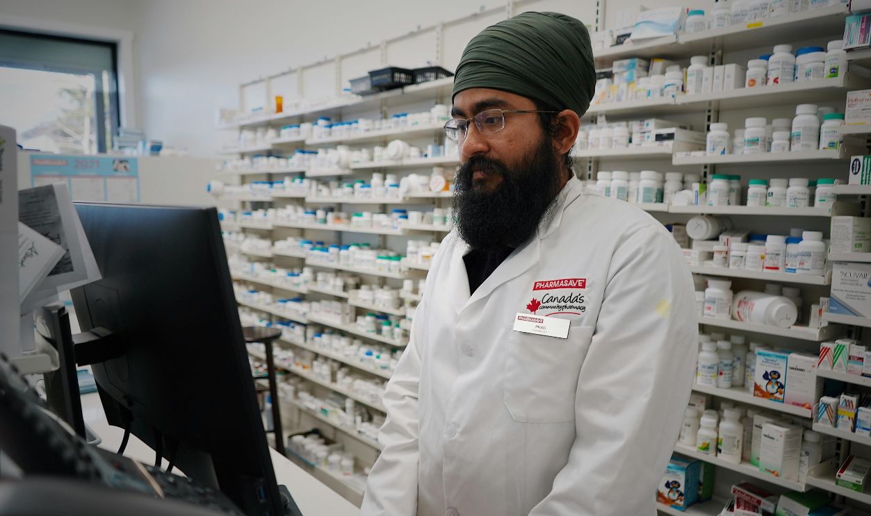 Pharmacist at counter