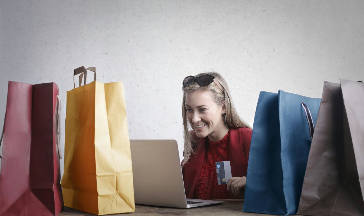 Happy woman shopping online
