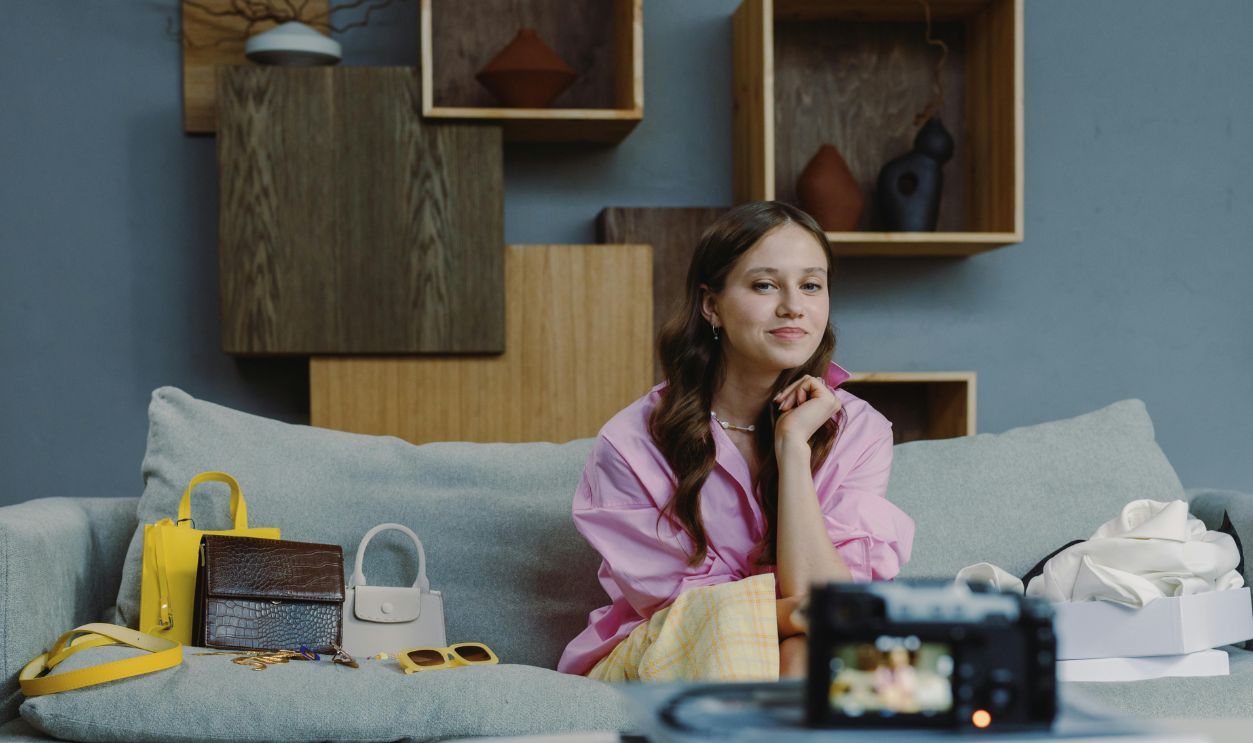 Woman Recording Video on Sofa