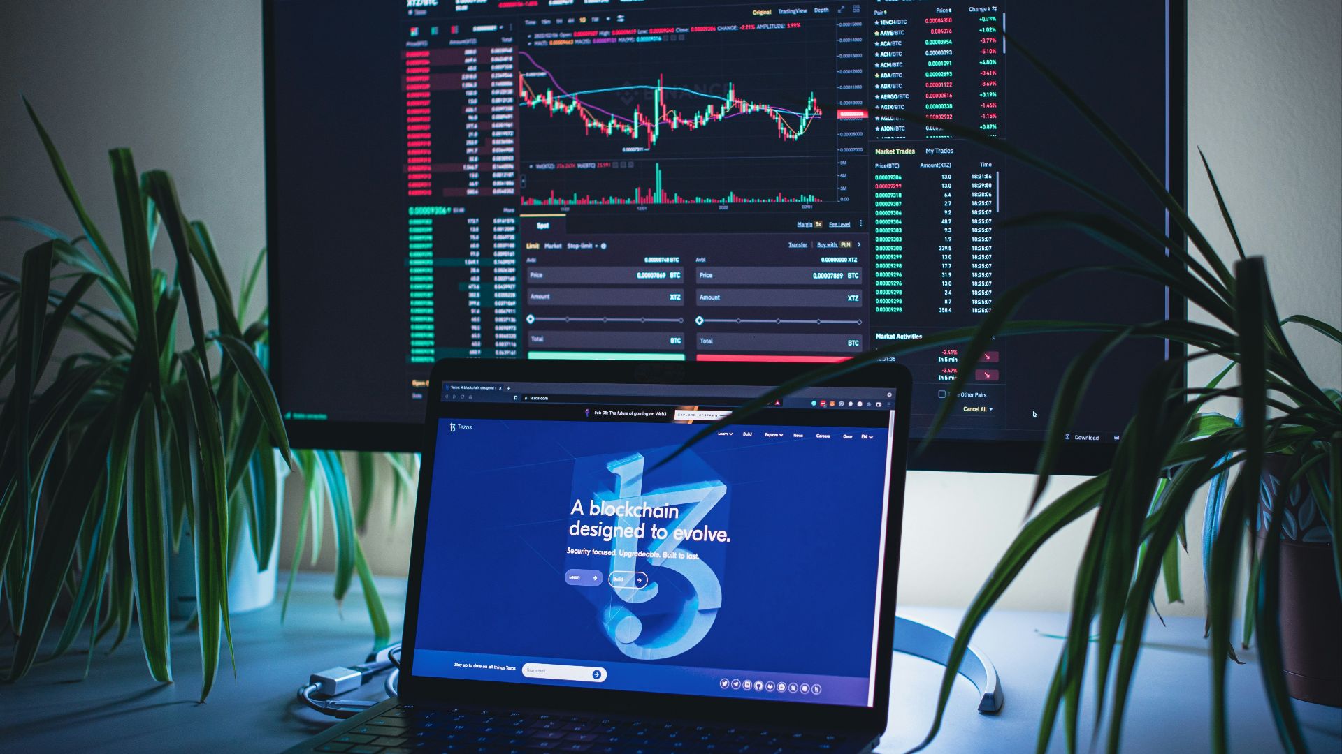 a laptop computer sitting on top of a desk