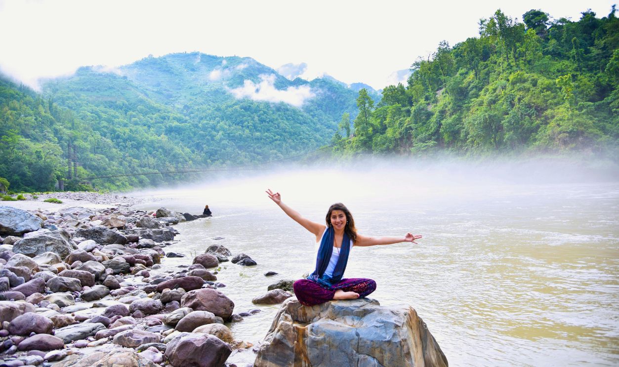  Woman Sitting on Stone