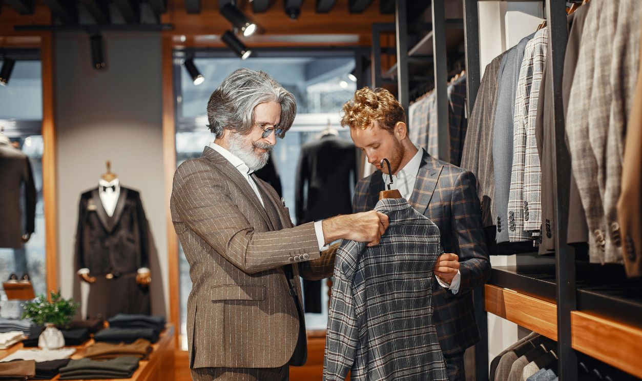 Men in a Boutique Choosing a Suit 